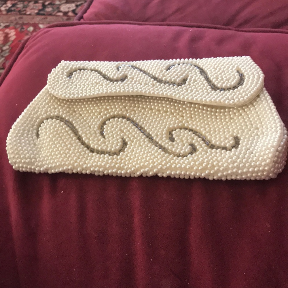 Elegant Cream Beaded Clutch with Textured Design